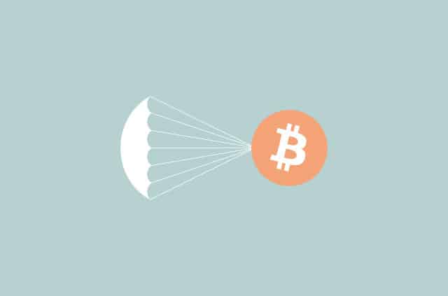   آرم بیت کوین با چتر 